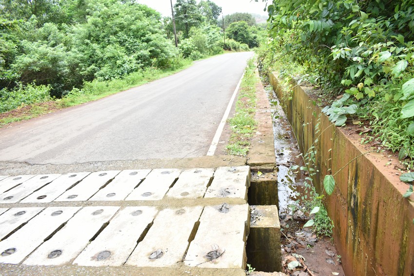 Hotmixing of road and Improvement of drainage system in Pale
